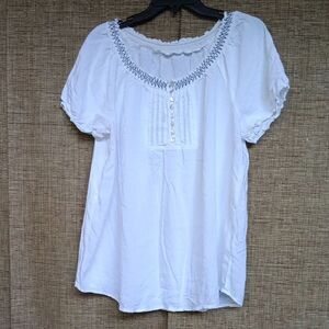 White Women's Top with Embroidered Details